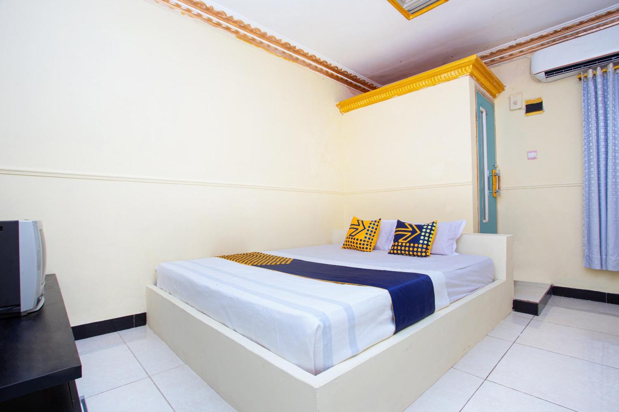 Spot On 2473 Buana Jaya Guest House سيلاكاب المظهر الخارجي الصورة