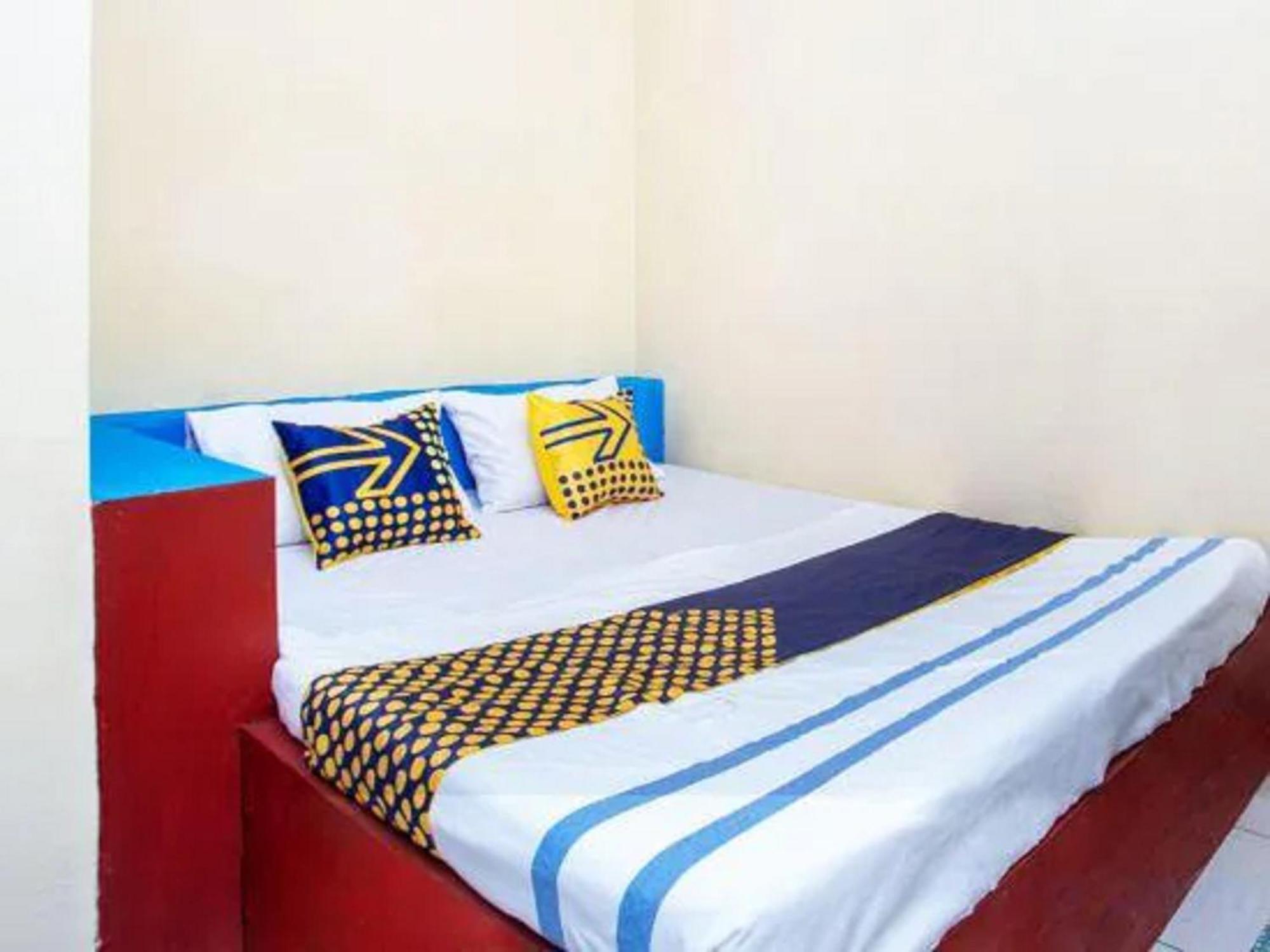 Spot On 2473 Buana Jaya Guest House سيلاكاب المظهر الخارجي الصورة