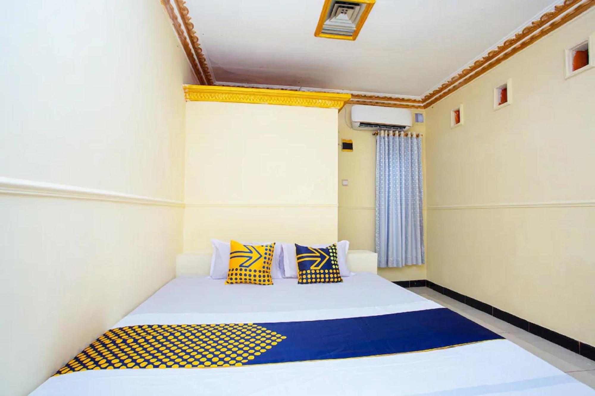 Spot On 2473 Buana Jaya Guest House سيلاكاب المظهر الخارجي الصورة